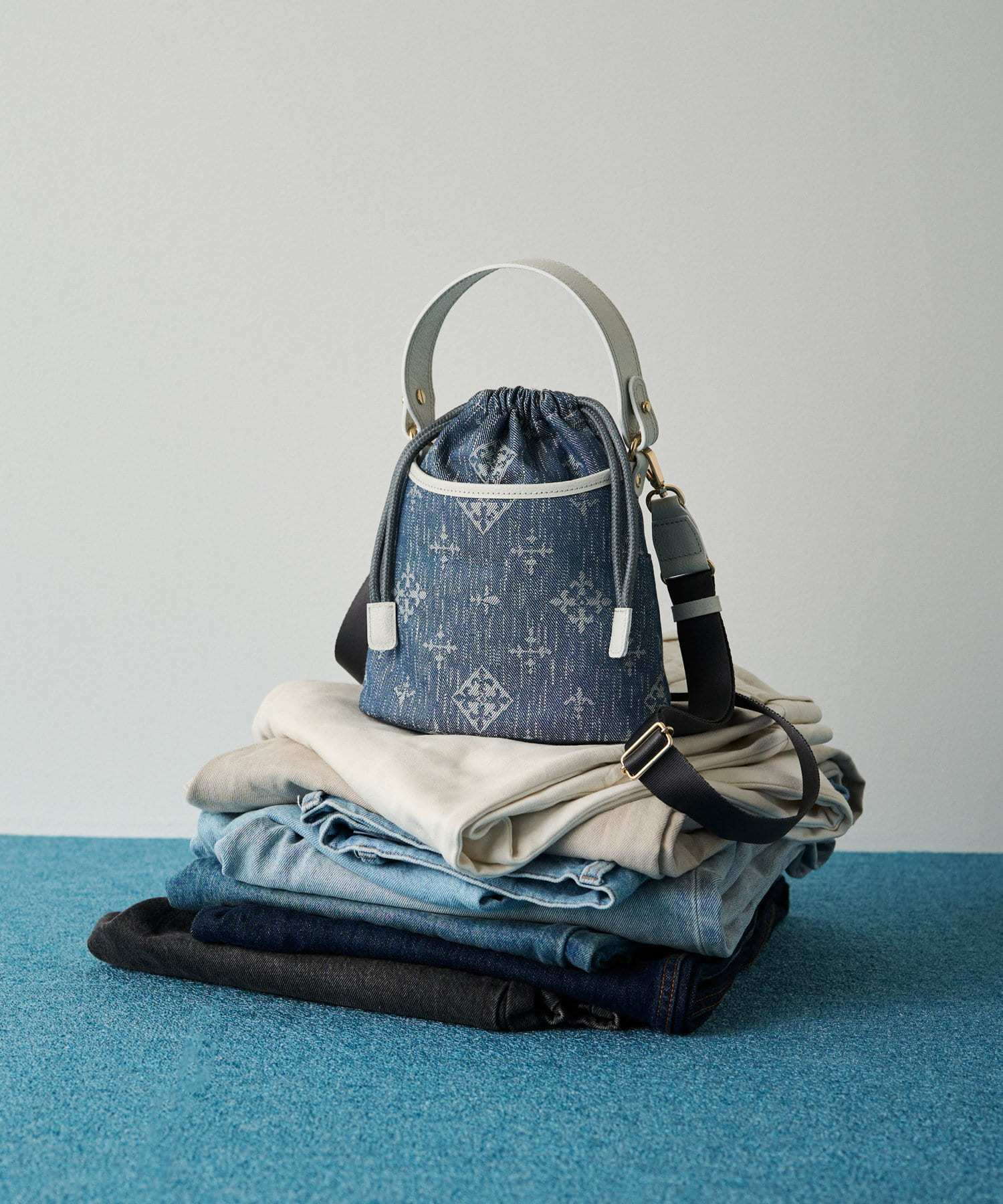 Russet [Denim jacquard] 2way drawstring mini shoulder bag Indigo